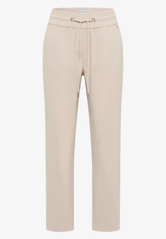 Beige Jogginghose mit Tunnelzugbund und geradem Schnitt.