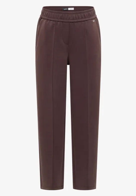Braune, gerade geschnittene Hose mit elastischem Bund und seitlichen Taschen aus weichem Stoff.