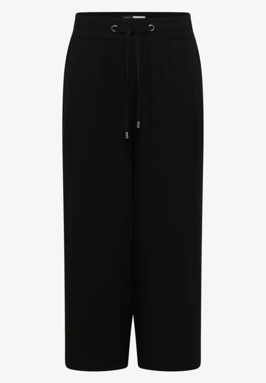 Pantalon noir ample à cordon de serrage, coupe droite et longueur cheville.