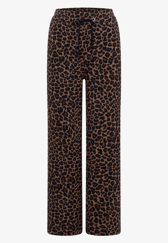 Pantalon ample élégant à motif léopard marron et noir.