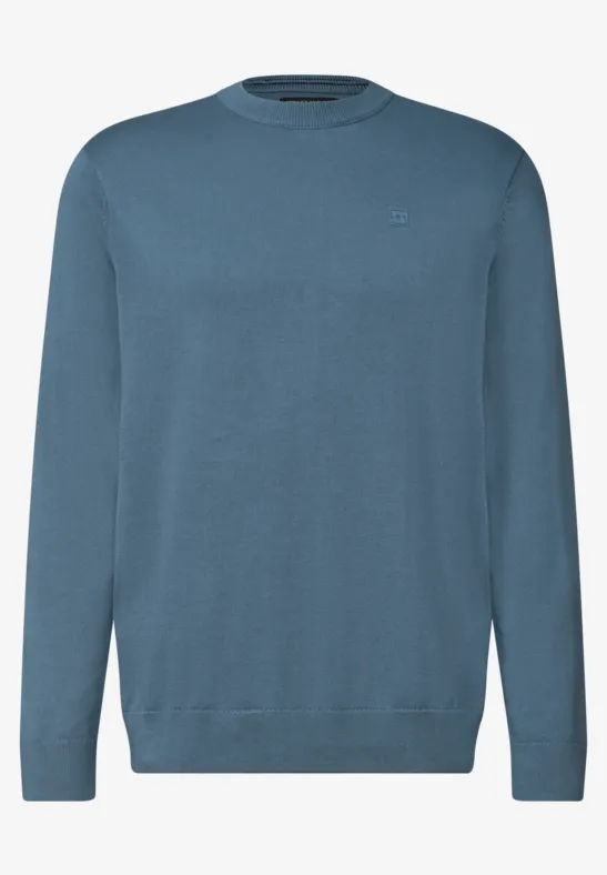 Ein schlichter, langärmeliger Pullover in gedämpftem Blauton mit Rundhalsausschnitt.