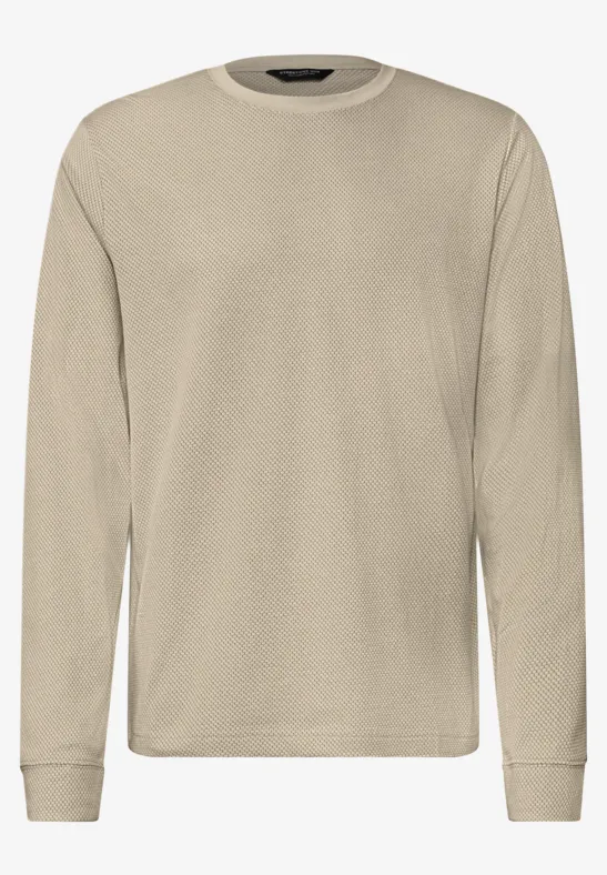 Schlichtes, beiges Langarmshirt mit Rundhalsausschnitt, Frontalansicht.
