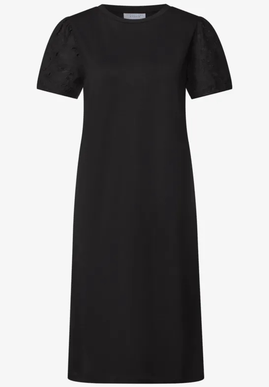 Schwarzes Midikleid mit Rundhalsausschnitt und kurzen Puffärmeln, schlicht und elegant.