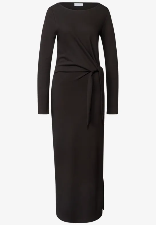 Schwarzes, langärmeliges Midikleid mit seitlichem Knotendetail und figurbetonter Passform.