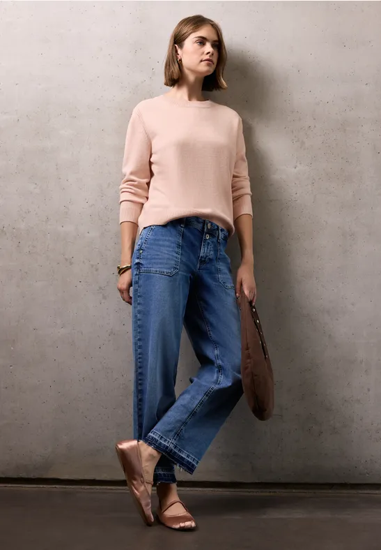 Pull doux avec détails peachy blush mel.