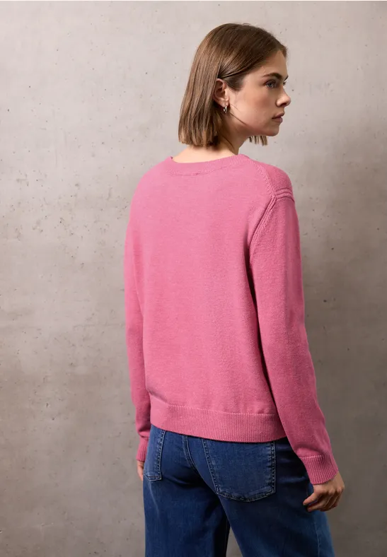 Pull doux avec détails candy pink mel.