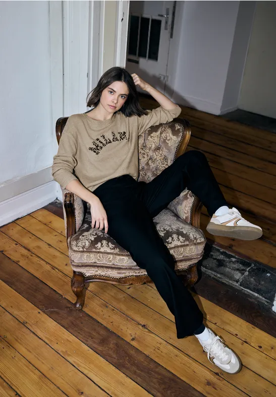 Trui met leo-opdruk buffed beige mel.