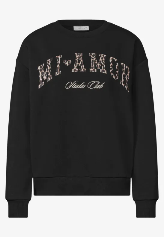 Schwarzer Pullover mit Schriftzug "MI-XAGER Santa Club".