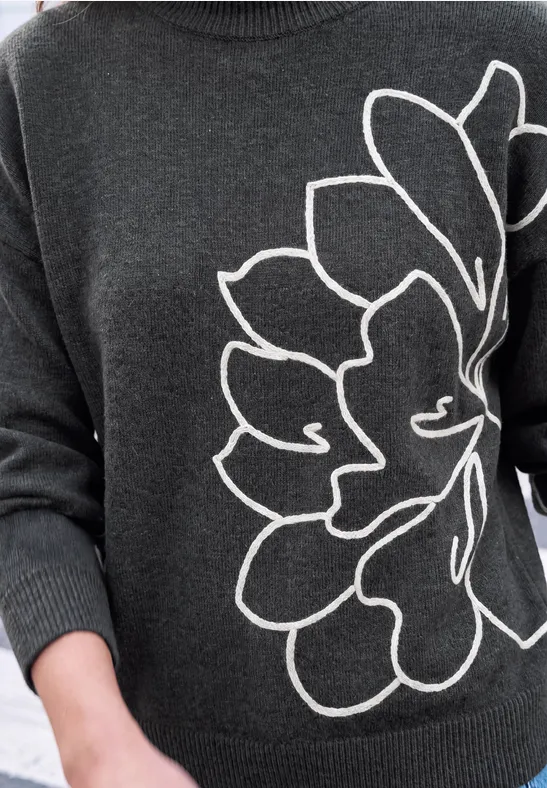Dunkelgrauer Pullover mit großem weißen Blumenmuster auf der Vorderseite