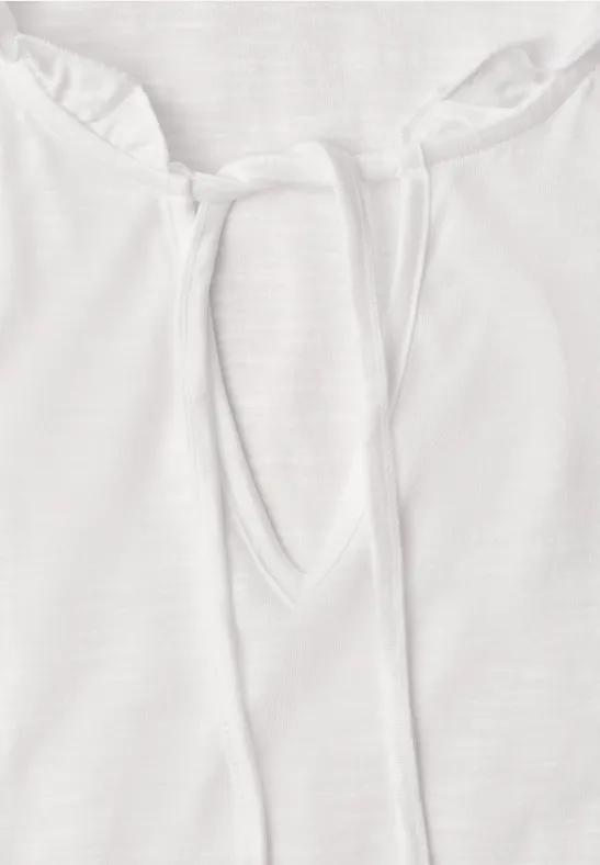 Witte blouse met V-hals en striklint