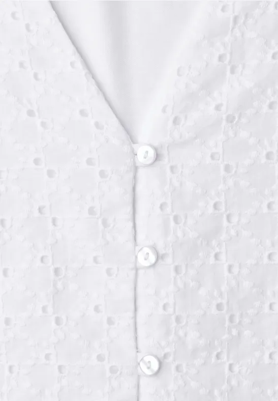Blouse blanche en broderie anglaise à boutons blancs