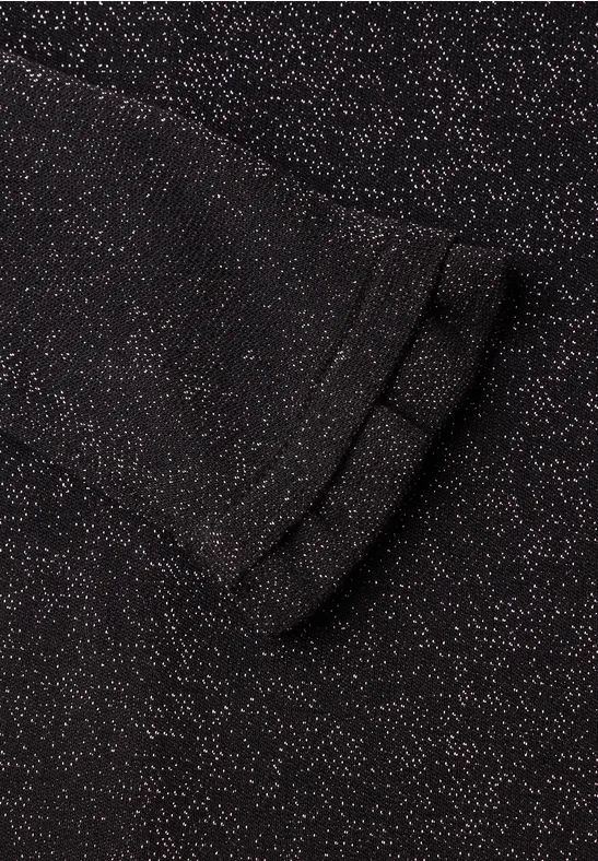 Schwarzes Glitzerstoffstück mit feinen silbernen Punkten