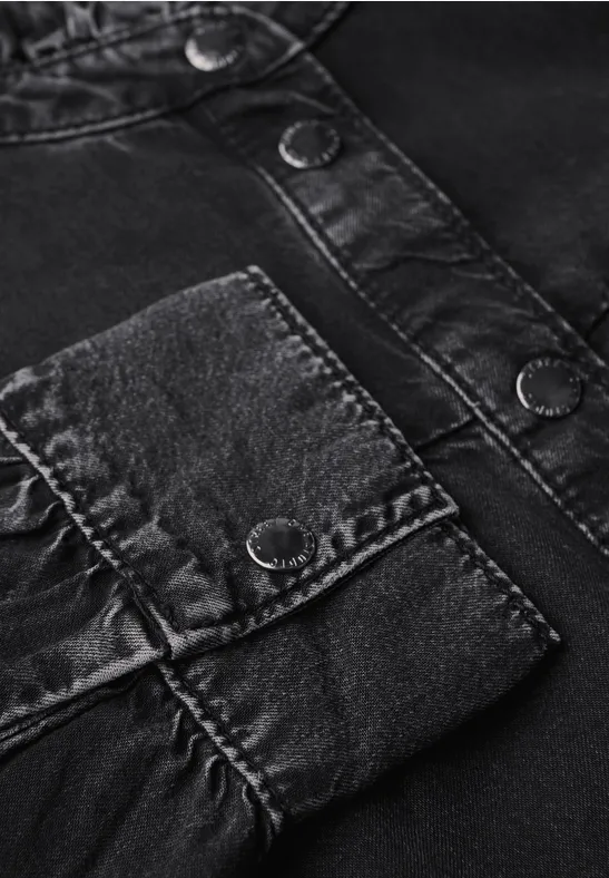 Blouse en jean à volants black washed