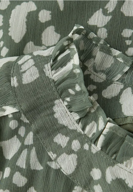 Blouse en mousseline de soie à motifs null