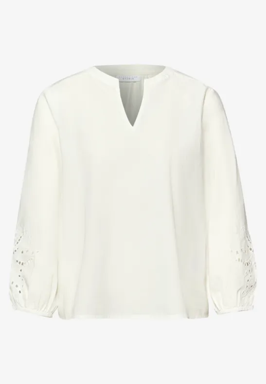 Blouse met gespleten hals en borduursel off white