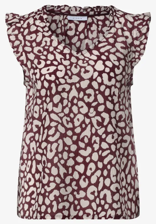 Ärmelloses V-Neck-Top in bordeauxrotem Stoff mit cremefarbenem Leopardenmuster und zarten Rüschenärmeln