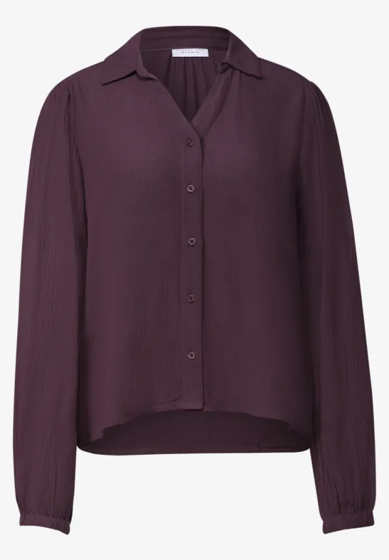 Paarse blouse met lange mouwen, kraag en knopen, losse pasvorm