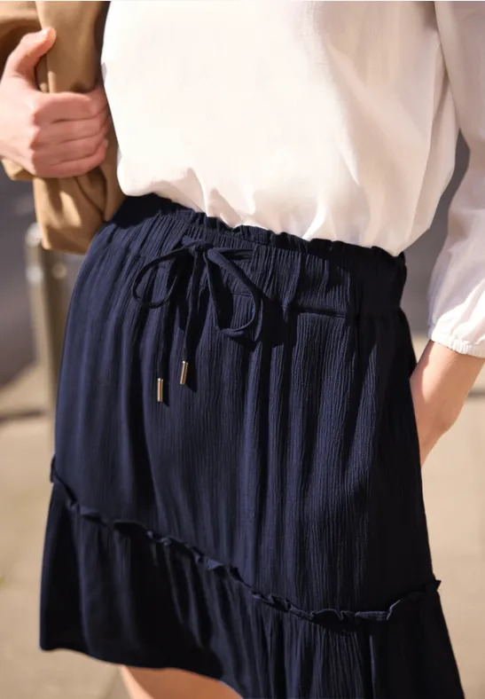 Knielange rok met volants en zakken midnight muse