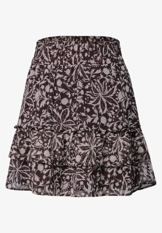 Korte zwarte rok met wit bloemenprint, hoge taille en gelaagde volant