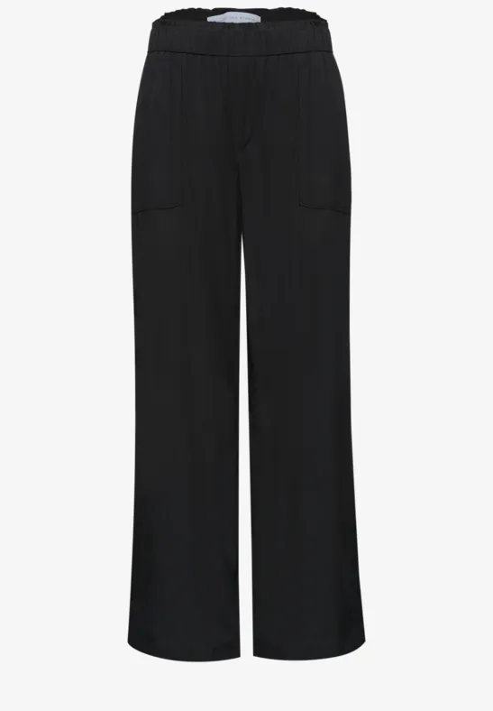 Pantalon noir ample avec taille élastique et poches plaquées