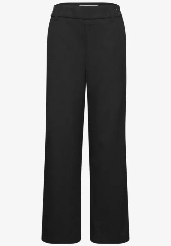 Schlichte schwarze Hose mit weitem Schnitt und ohne sichtbare Details