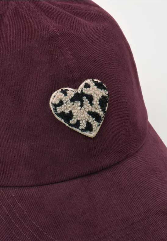 Cap aus Cord mit Herdetail very berry