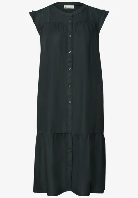 Robe midi noire sans manches avec boutonnage devant et volants aux épaules.