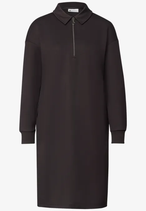Robe en molleton arrivant aux genoux, avec fermeture éclair black coffee Robe polo noire à manches longues avec fermeture éclair au col et poignets côtelés.