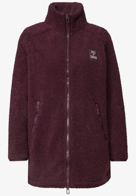 Lange lila Teddy-Fleecejacke mit Frontreißverschluss, hohem Kragen und zwei seitlichen Taschen.
