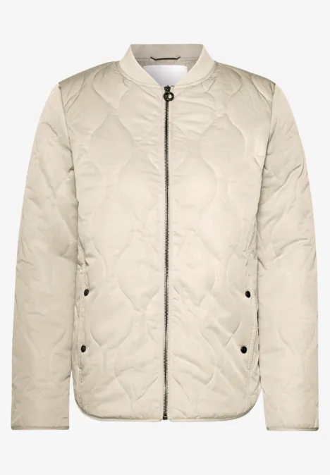 Blouson met doorgestikt patroon en ritssluiting barley beige Beige doorgestikte bomberjack met ritssluiting, opstaande kraag en zijzakken.