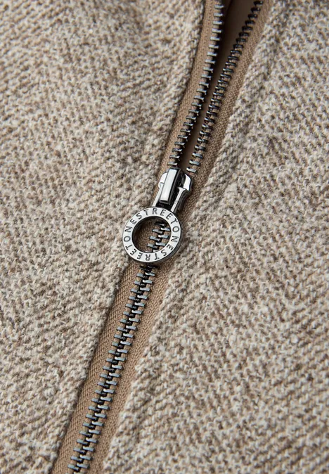 Jas met opstaande kraag light terra mocha mel.