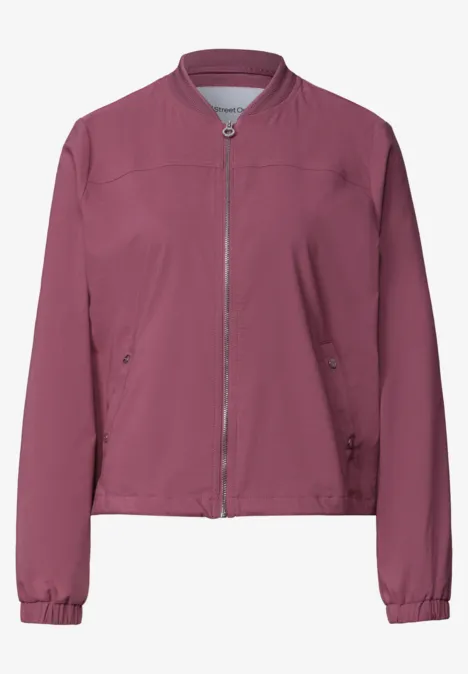 Blouson met lange mouwen en ritssluiting dark clouded blush Een effen bomberjack in donkerroze met ritssluiting en zijzakken.