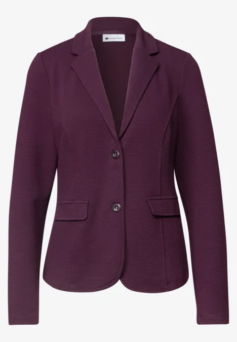 Damenblazer in dunklem Violett mit Reverskragen, zwei Knöpfen und seitlichen Pattentaschen