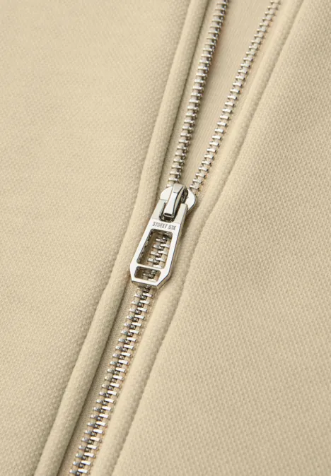 Kort vest met trekkoord smoke beige mel.