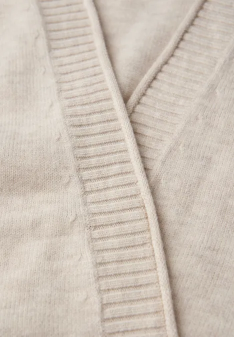 Cardigan mit Rollkante tusk cream mel.