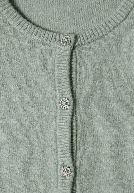 Langarm Cardigan mit Rundhals und Knöpfen eucalyptus green mel. Nahtlos gestrickter hellgrüner Cardigan mit funkelnden silbernen Knöpfen.