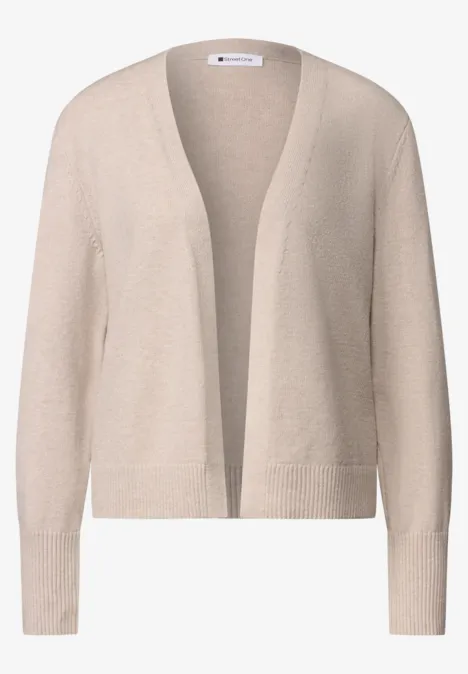 Cardigan beige léger, coupe ouverte et manches longues.