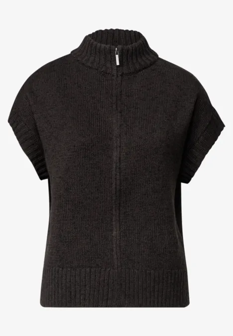 Vest met afhangende schouders, coltrui en ritssluiting black coffee mel. Kurzärmliger, dunkler Strickpullover mit hohem Kragen und mittig verlaufendem Reißverschluss.
