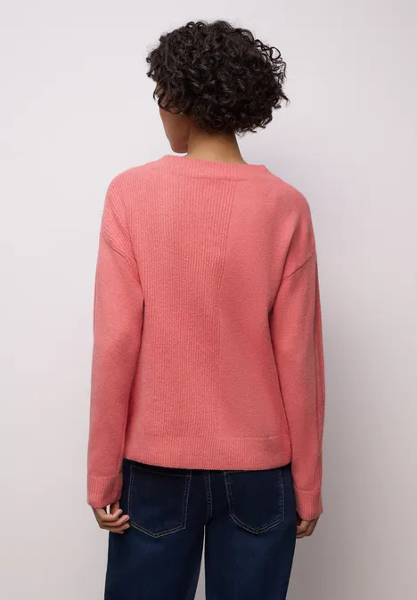 Trui met structuurmix striking coral mel.