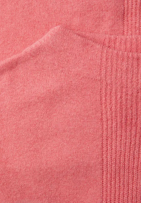 Trui met structuurmix striking coral mel.