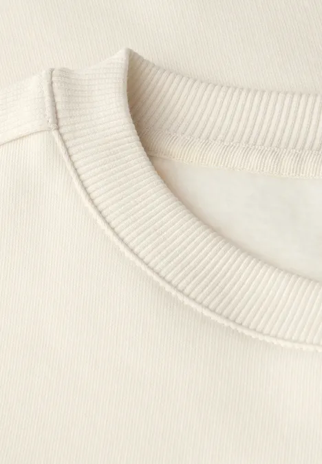 Sweater met geribd detail soft beige