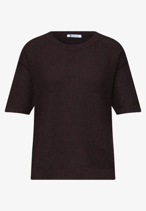 Dunkles, kurzärmeliges Strickshirt mit Rundhalsausschnitt und leicht kastigem Schnitt.