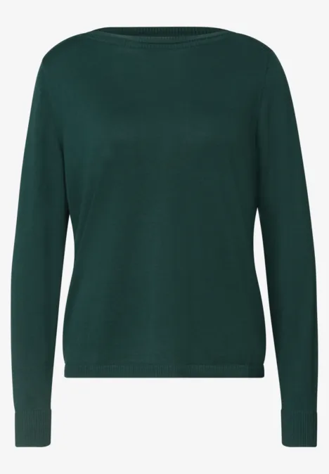 Dunkelgrüner, langärmeliger Pullover mit Rundhalsausschnitt.