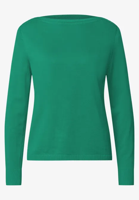 Grüner Pullover mit langen Ärmeln und schlichtem Rundhalsausschnitt.