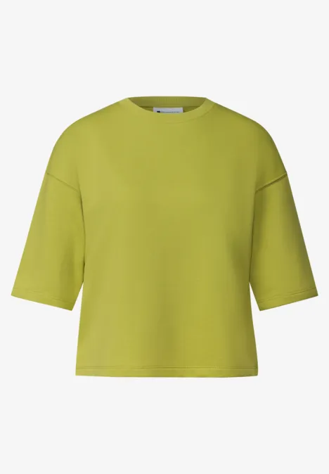 Kurzarm Sweatshirt mit Rundhals apple lime Lime-grünes, kastiges Cropped-T-Shirt mit kurzen Ärmeln und Rundhalsausschnitt.