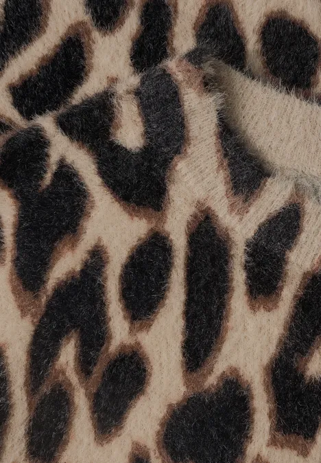 Nahaufnahme eines beige-braunen Leopardenmusters mit schwarzen Flecken.