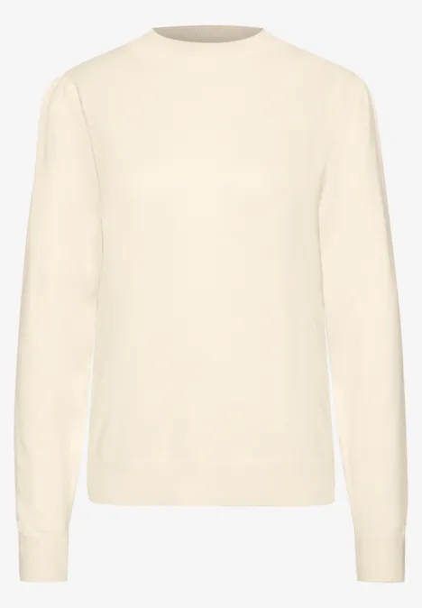 Schlichter, cremefarbener Pullover mit Rundhalsausschnitt und langem Arm.