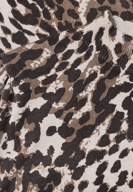 Nahaufnahme eines Stoffes mit braun-schwarzem Leopardenmuster.