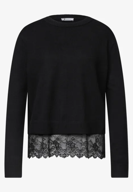 Pullover mit Rundhals und Spitzenkante Black Schwarzer Pullover mit rundem Ausschnitt und Spitzenbesatz am Saum.