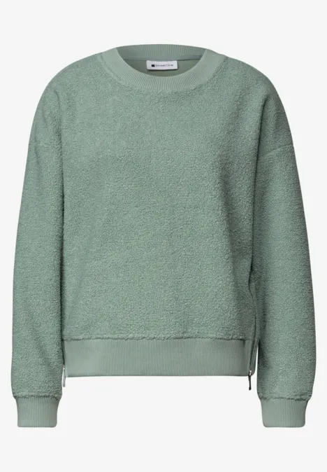 Teddy-Sweatshirt mit Zipperdetails eucalyptus green Hellgrünes Fleece-Sweatshirt mit Rundhalsausschnitt, langen Ärmeln und seitlichen Reißverschlüssen.